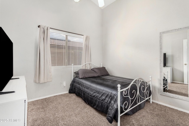 bedroom featuring baseboards and carpet flooring