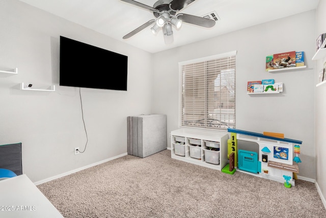 game room featuring ceiling fan, carpet, visible vents, and baseboards