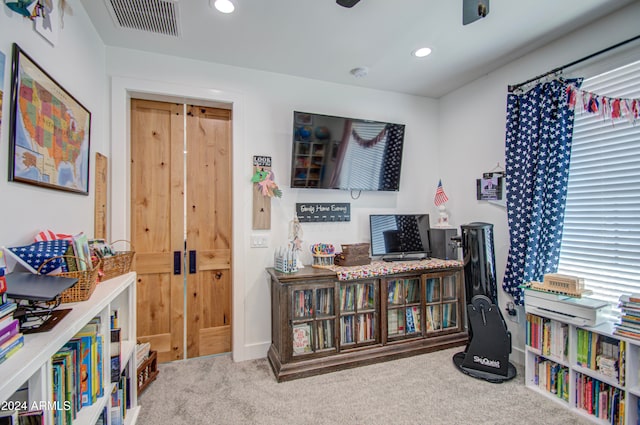 recreation room featuring carpet flooring