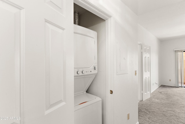 19400 N Westbrook Pkwy Unit 220, Peoria, AZ 85382 - washroom featuring stacked washer / drying machine and carpet floors