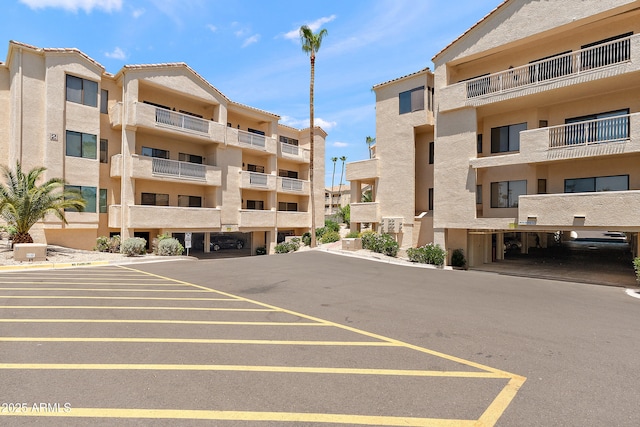 19400 N Westbrook Pkwy Unit 220, Peoria, AZ 85382 - view of apartment building / complex with uncovered parking
