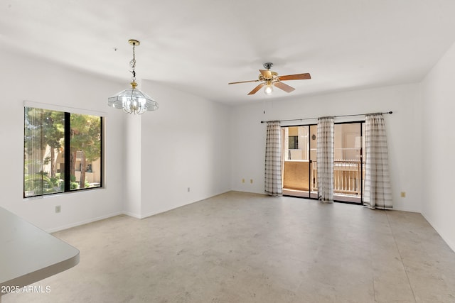 19400 N Westbrook Pkwy Unit 220, Peoria, AZ 85382 - unfurnished room featuring a chandelier, a ceiling fan, and finished concrete floors