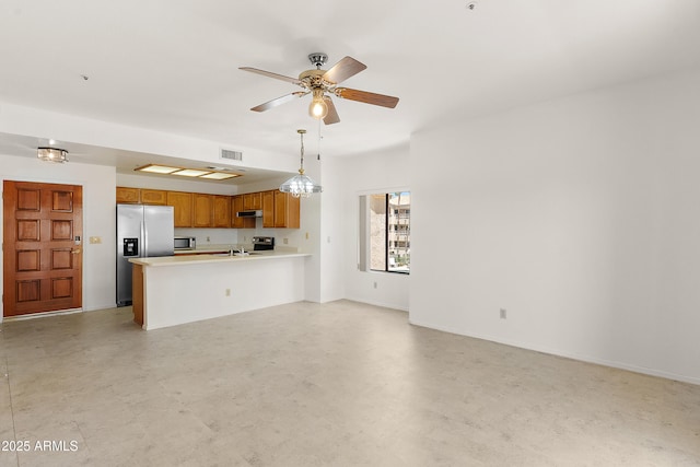 19400 N Westbrook Pkwy Unit 220, Peoria, AZ 85382 - unfurnished living room with ceiling fan and baseboards