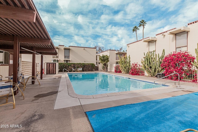 view of pool featuring a patio