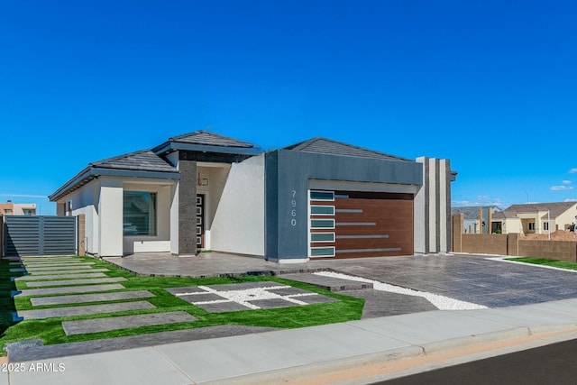 view of front of property with a garage