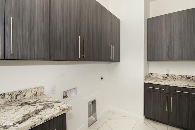 laundry area with electric dryer hookup, cabinets, and hookup for a washing machine