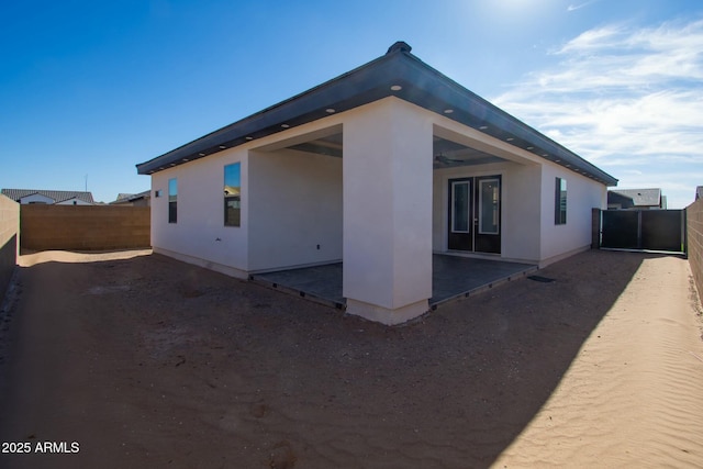 view of side of home featuring a patio