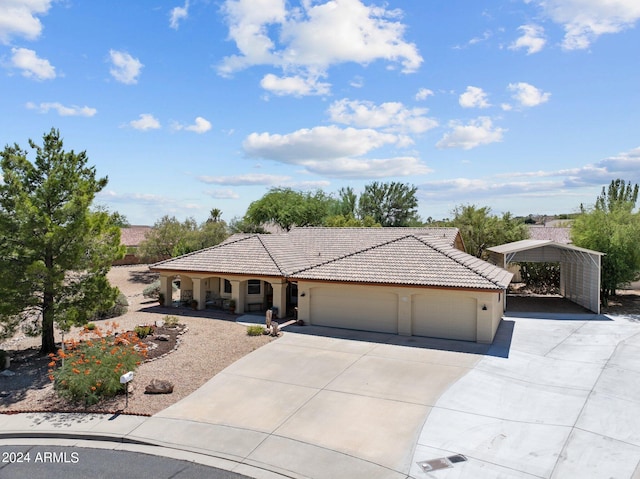 view of front of home featuring a carport