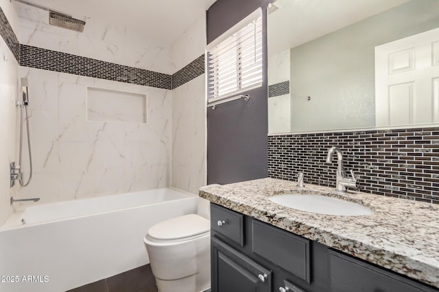 bathroom featuring vanity, toilet, shower / bathtub combination, and backsplash