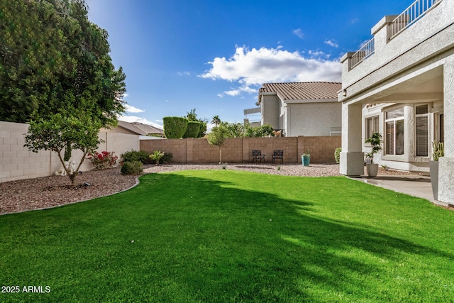 view of yard featuring a patio and a fenced backyard