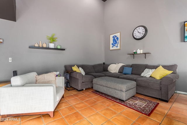 living room with tile patterned floors