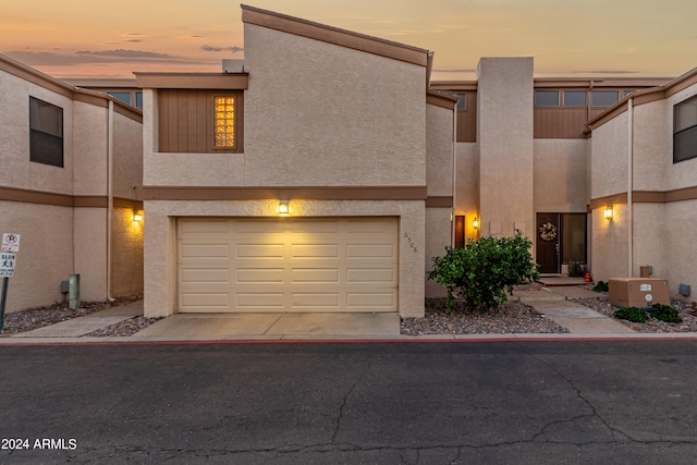 view of front of home with a garage