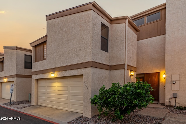 view of front of home with a garage