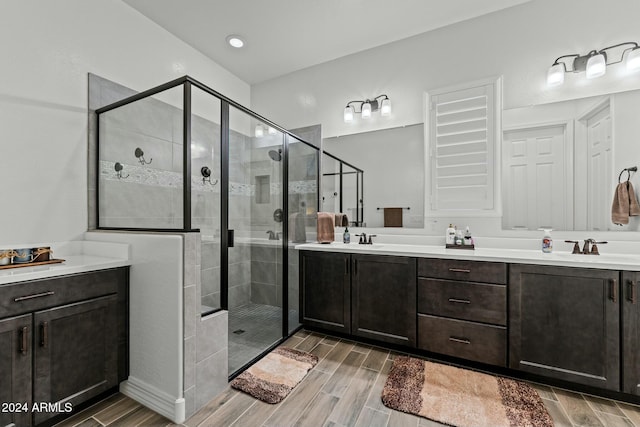 bathroom featuring vanity and walk in shower