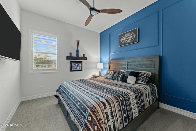 carpeted bedroom with ceiling fan