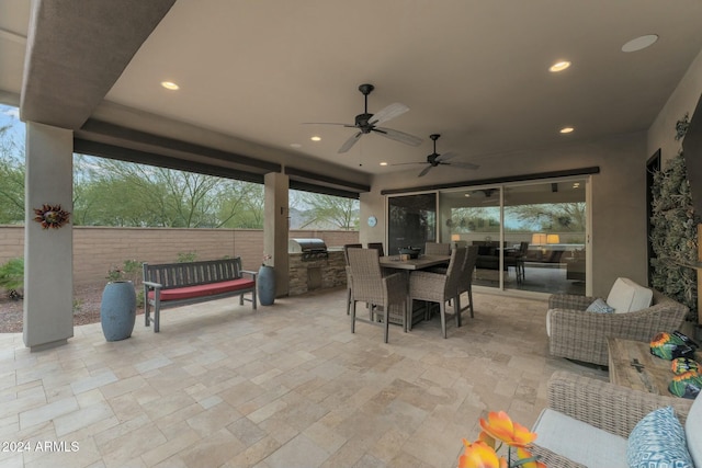 view of patio / terrace featuring grilling area, ceiling fan, and an outdoor hangout area