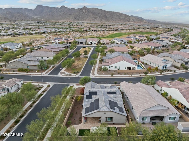 birds eye view of property featuring a mountain view