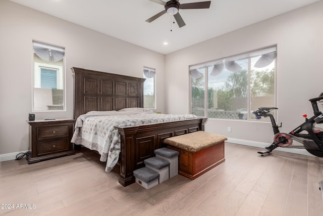 bedroom featuring light hardwood / wood-style flooring and ceiling fan