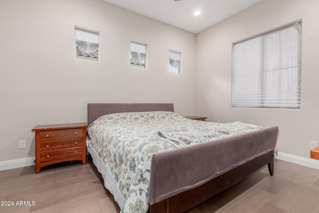 bedroom with light hardwood / wood-style floors