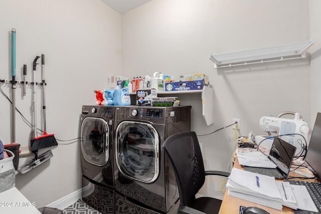 washroom featuring washing machine and clothes dryer