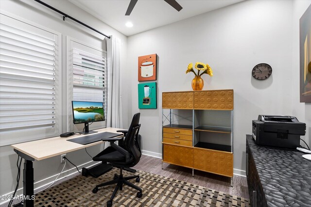 office space with recessed lighting, dark wood finished floors, a ceiling fan, and baseboards