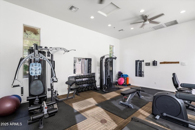 gym with baseboards, visible vents, and recessed lighting