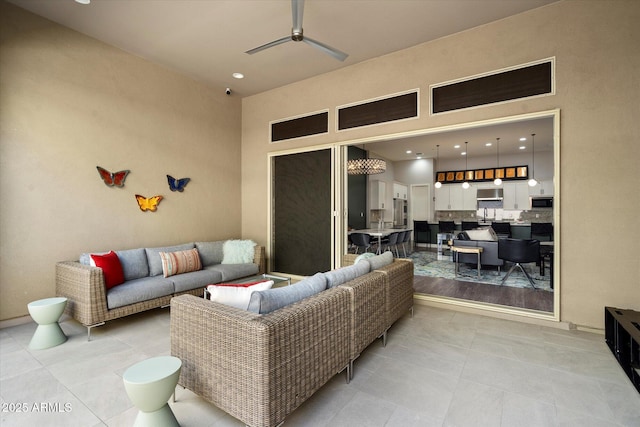 living room featuring light tile patterned floors, recessed lighting, and ceiling fan