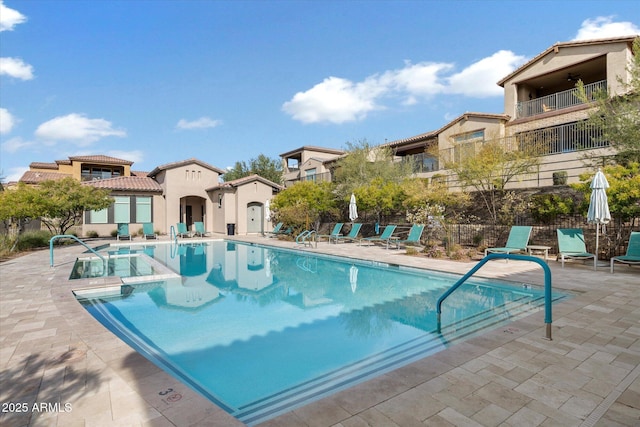 pool featuring a patio area