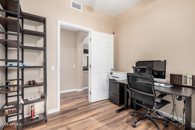 office space featuring hardwood / wood-style floors