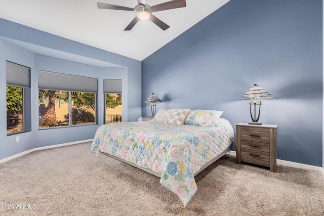 carpeted bedroom featuring ceiling fan and lofted ceiling