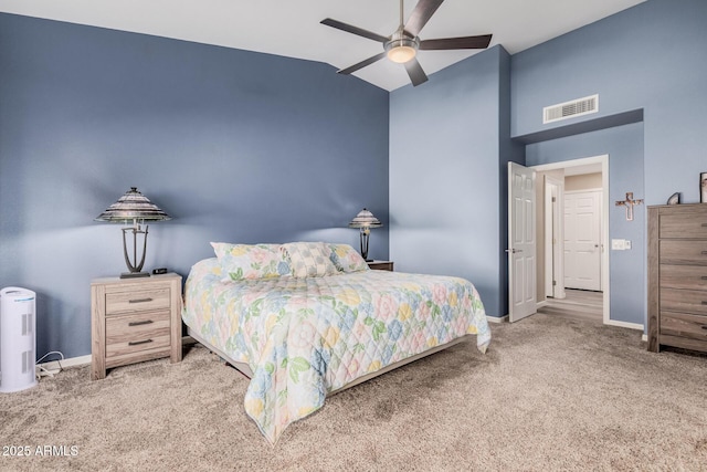 bedroom with lofted ceiling, carpet flooring, and ceiling fan