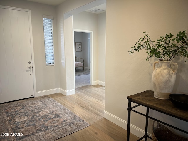 foyer entrance featuring light hardwood / wood-style flooring