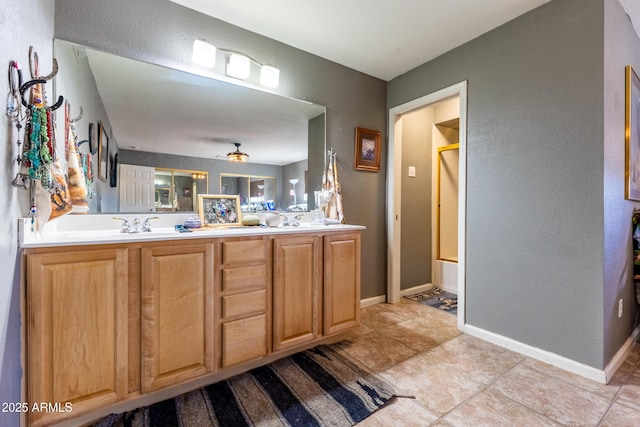 bathroom with shower / tub combination and vanity