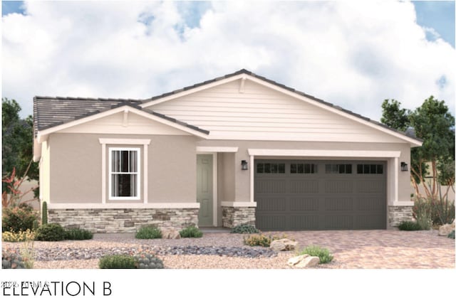 5353 W Manzanita Dr, Glendale, AZ 85302 - craftsman-style home with stone siding, an attached garage, stucco siding, and driveway