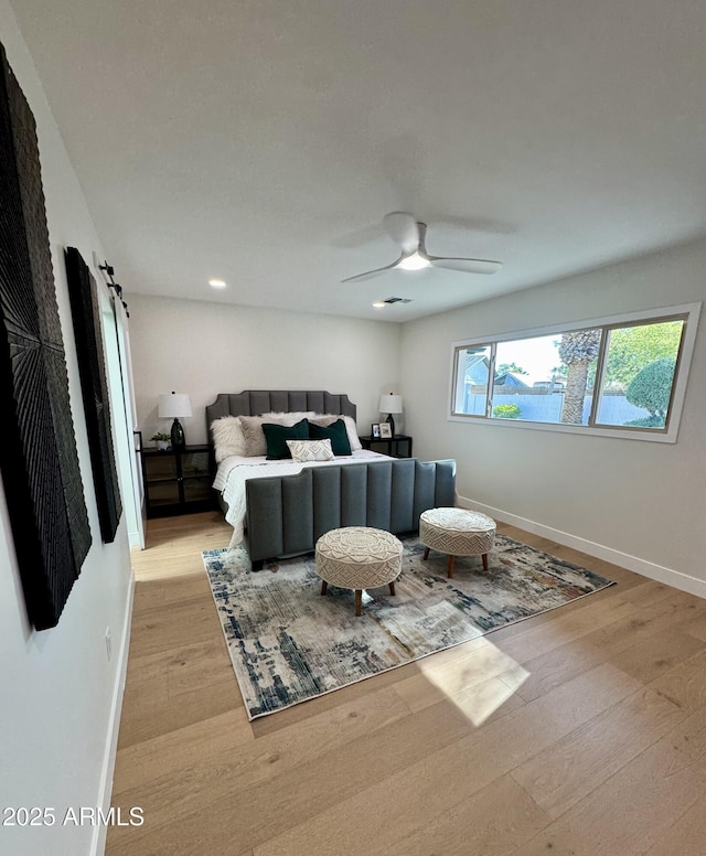 13601 N 50th Pl, Scottsdale, AZ 85254 - bedroom featuring light wood-style floors, baseboards, ceiling fan, and recessed lighting