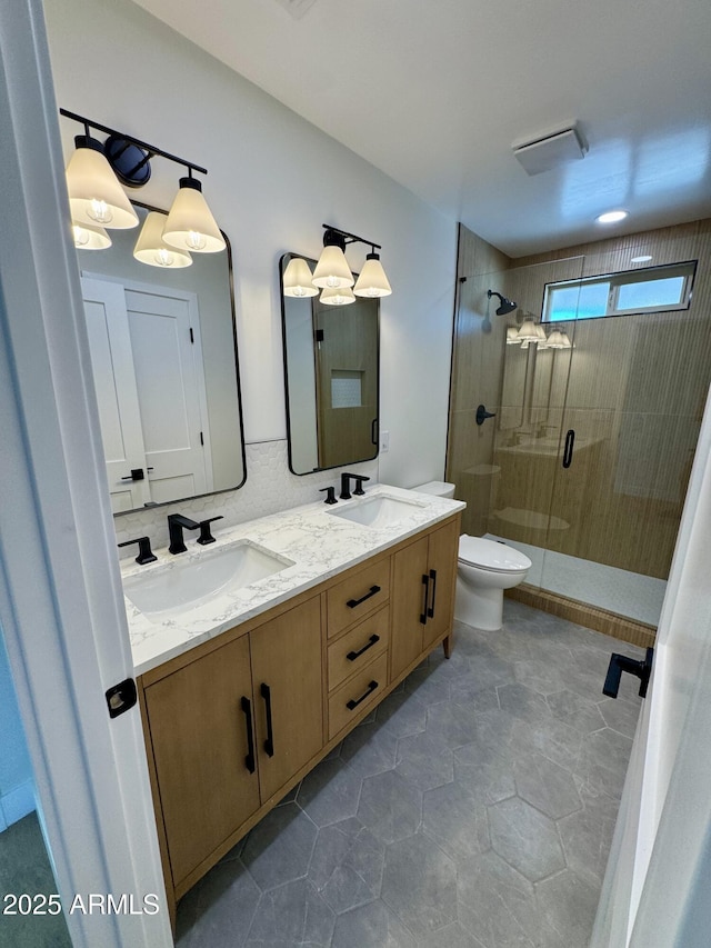 13601 N 50th Pl, Scottsdale, AZ 85254 - bathroom with a shower stall, double vanity, and toilet