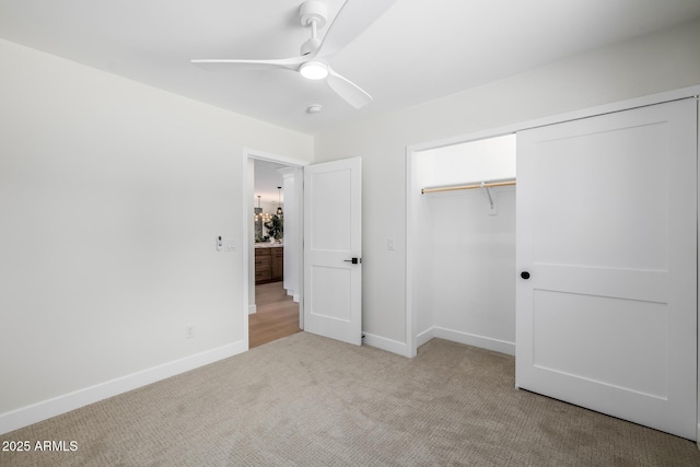 13601 N 50th Pl, Scottsdale, AZ 85254 - unfurnished bedroom with carpet flooring, baseboards, a closet, and ceiling fan
