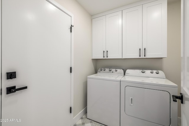 13601 N 50th Pl, Scottsdale, AZ 85254 - washroom with washing machine and clothes dryer, cabinet space, and baseboards