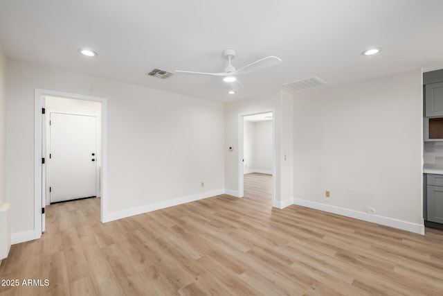 13601 N 50th Pl, Scottsdale, AZ 85254 - unfurnished living room with a ceiling fan, light wood-type flooring, recessed lighting, and baseboards