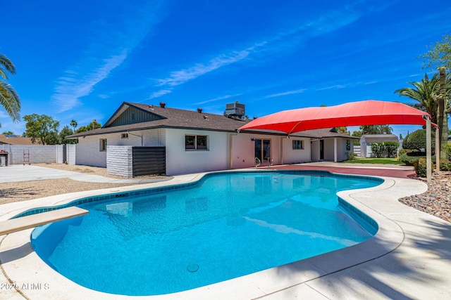 13601 N 50th Pl, Scottsdale, AZ 85254 - view of swimming pool with a patio area and a diving board
