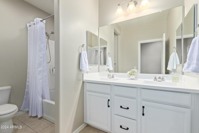 full bathroom featuring toilet, vanity, shower / tub combo, and tile patterned flooring