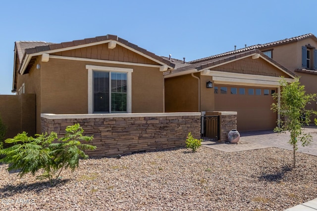 view of front of property with a garage