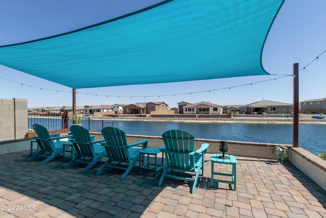 view of patio / terrace featuring a water view