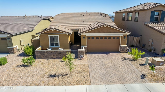 view of front of property with a garage