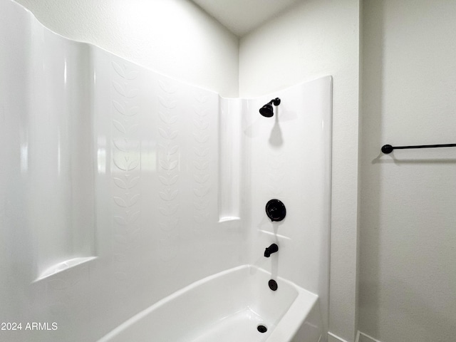 bathroom featuring  shower combination