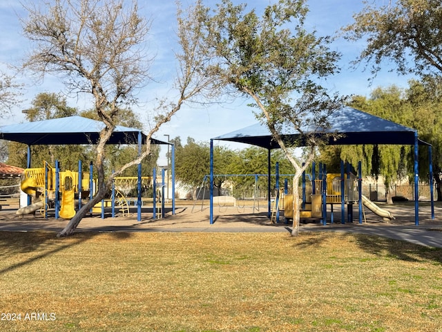 view of play area featuring a lawn