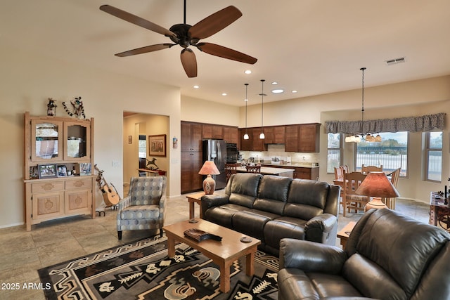 living room featuring ceiling fan