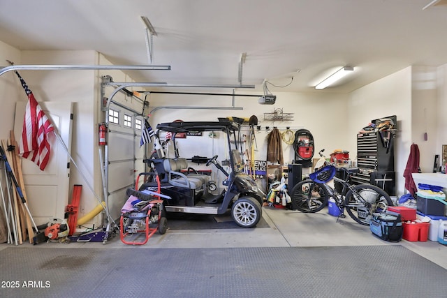 garage featuring a garage door opener