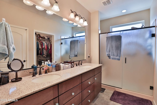 bathroom featuring vanity and walk in shower