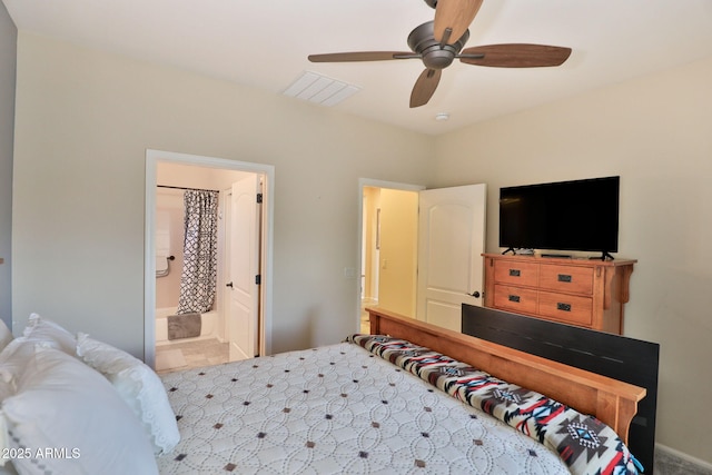 bedroom featuring ceiling fan and ensuite bathroom